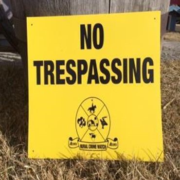 No trespassing SE Alberta rural crime watch sign